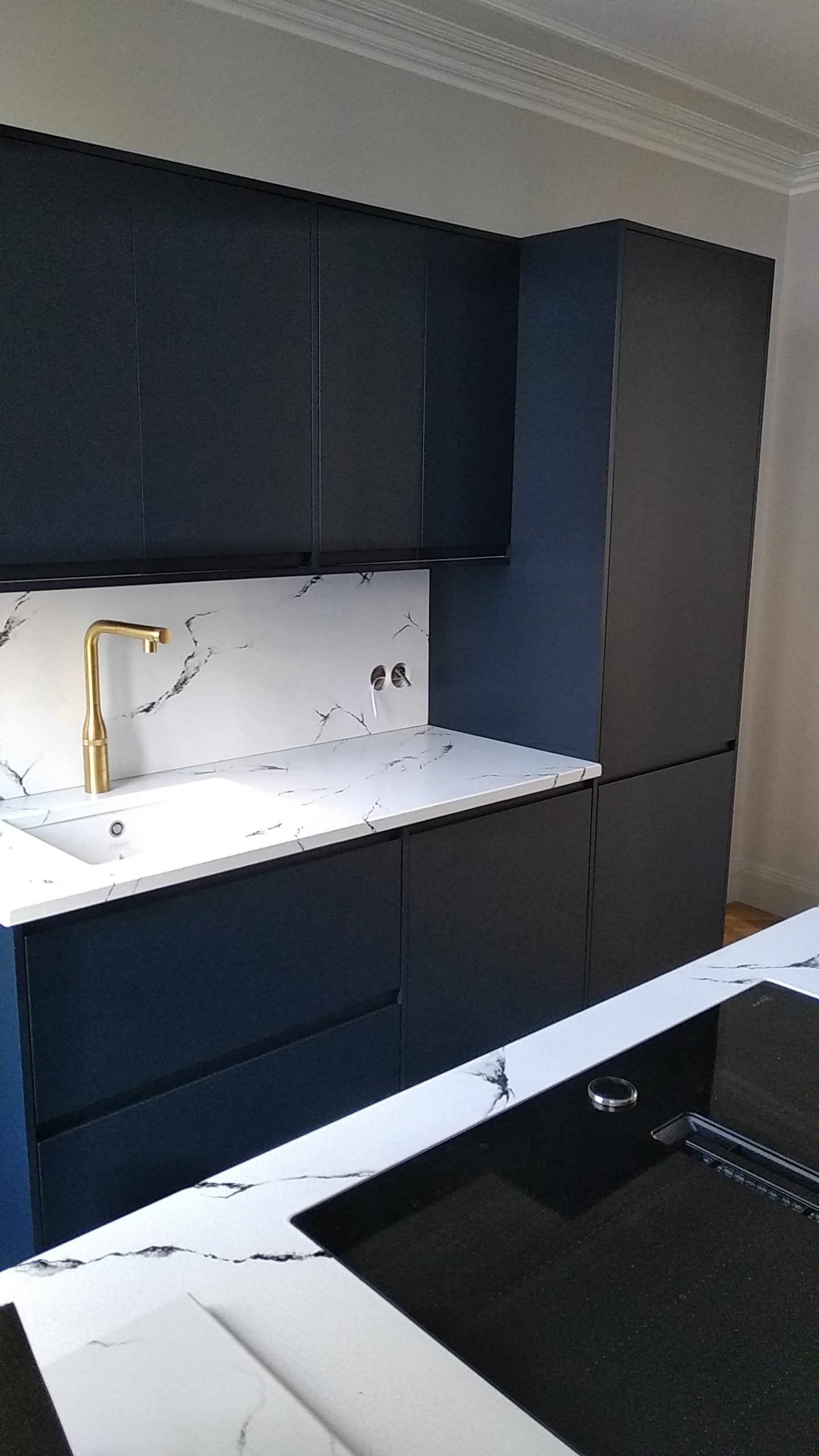 Enamelled lava stone kitchen tops credenza and central island